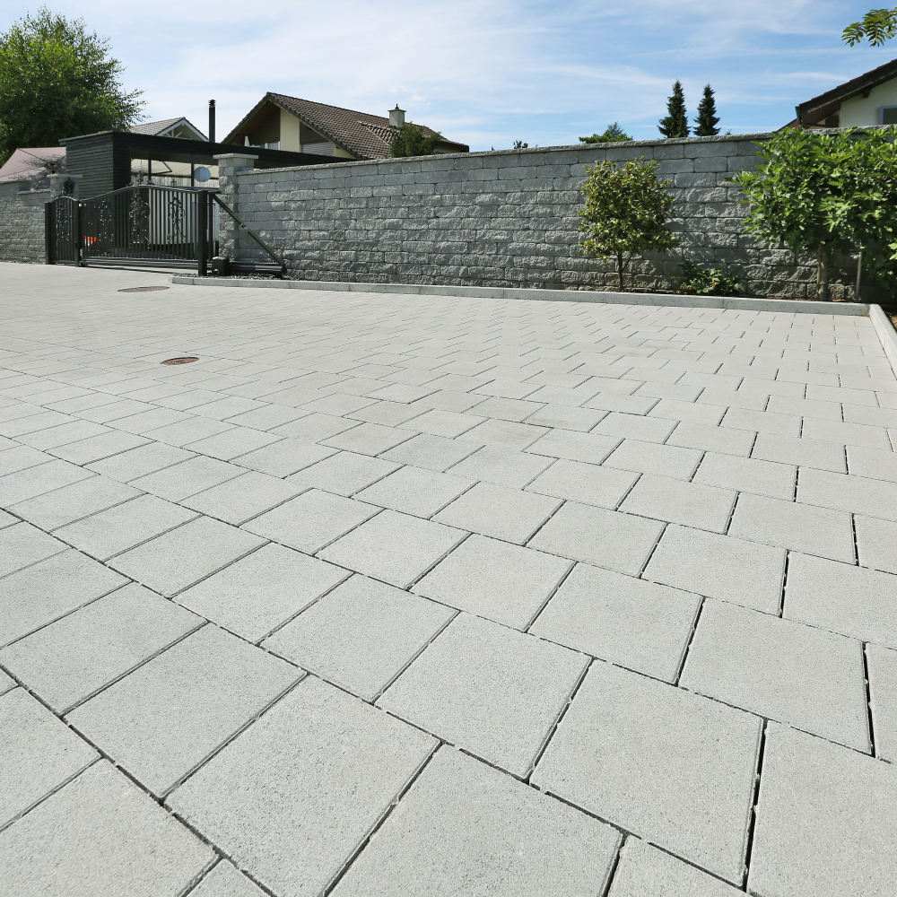 CARENA Pflasterstein mit Nockenverbund, schwarz, glatt, gefast