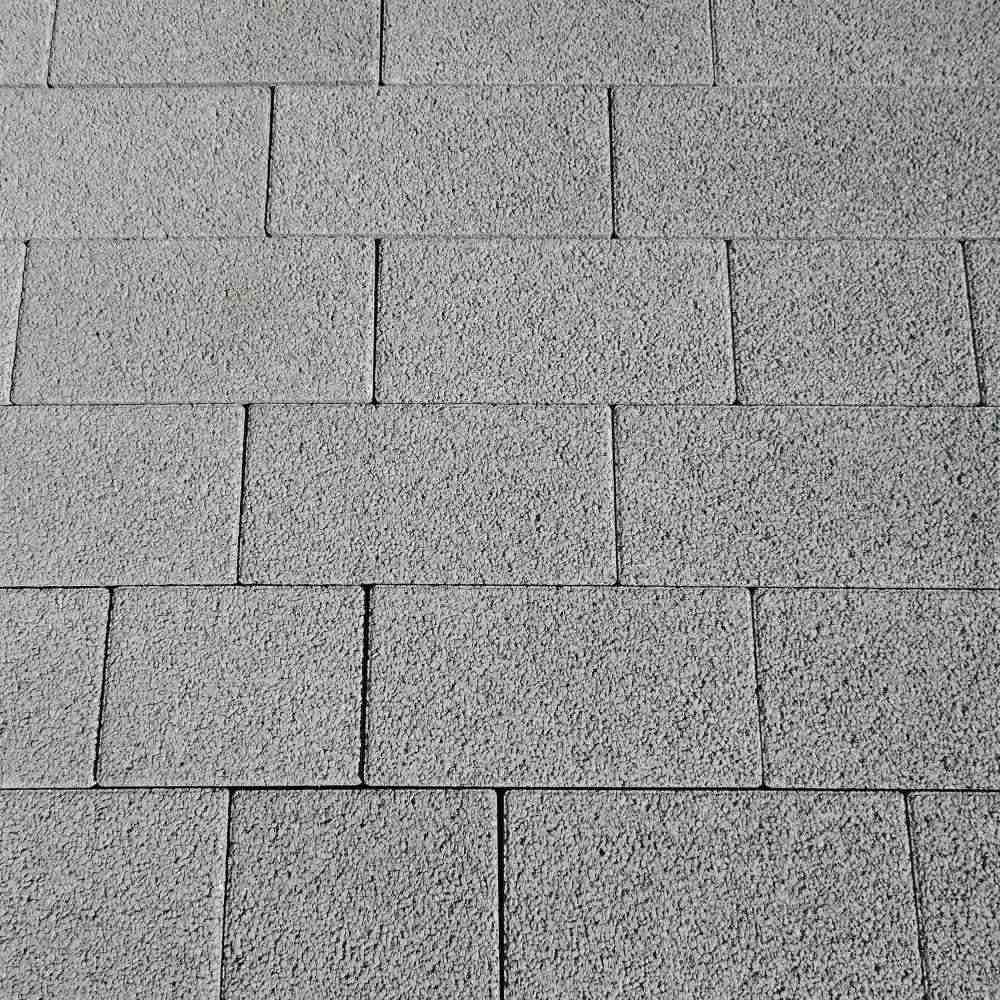 RAINA Sickerstein fino mit Nocken, grau, haufwerksporig, fein, gefast